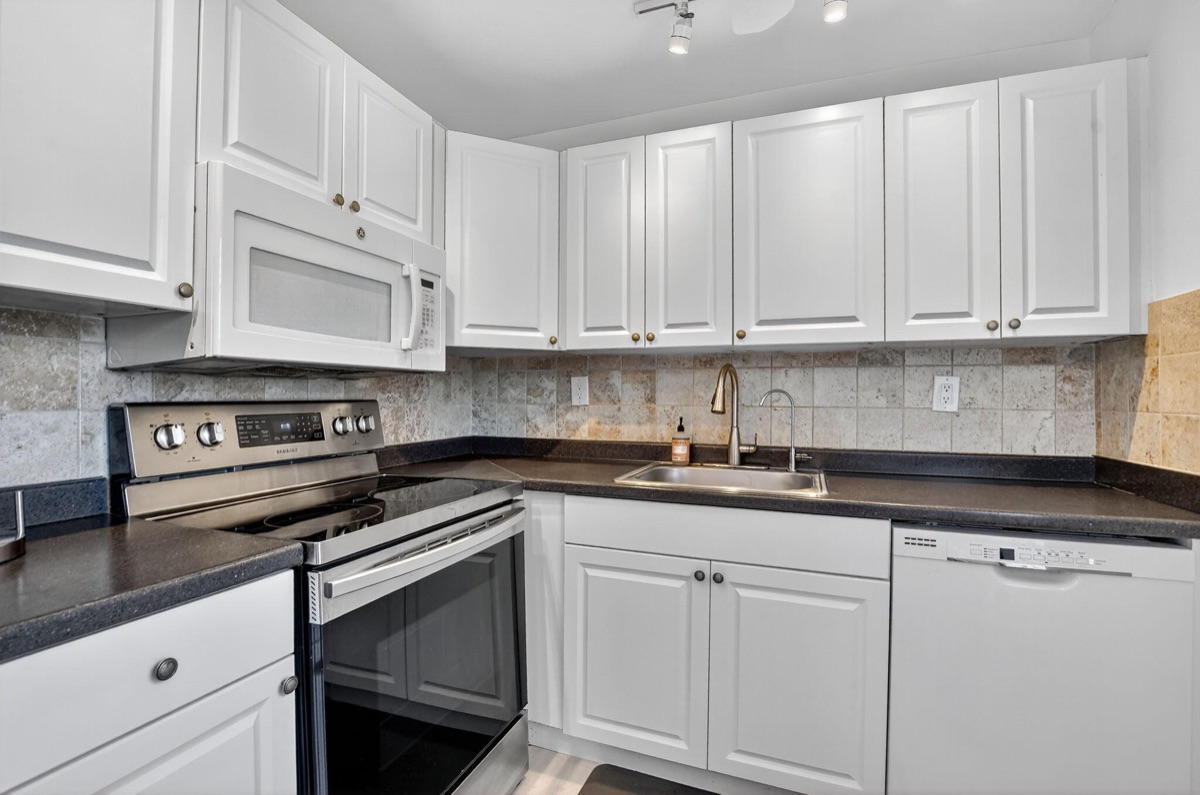 Updated kitchen at 739 Normandy P, Kings Point, Delray Beach — 2 bed 2 bath under contract