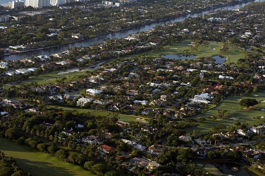 Aerial view of Royal Palm Yacht & Country Club estates, golf fairways and the Intracoastal in Boca Raton